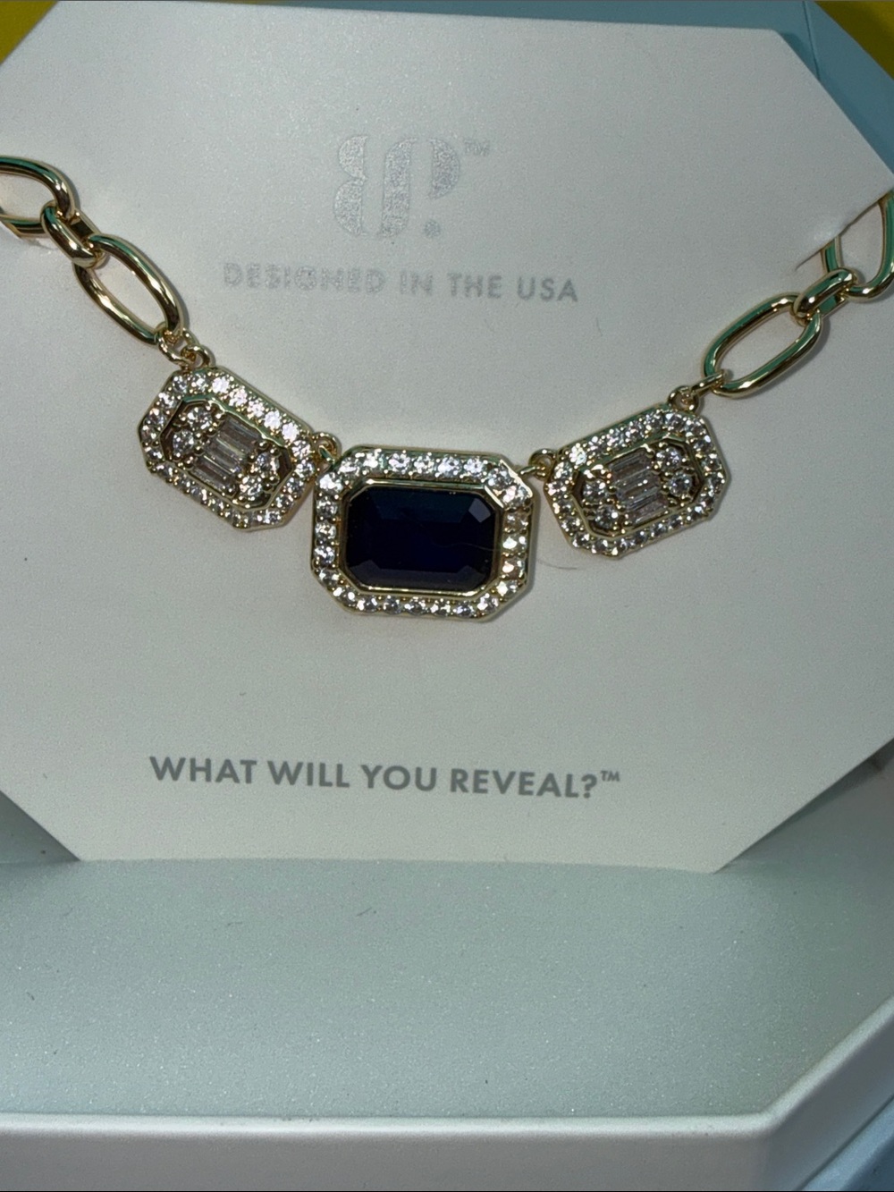 Gold-Tone Necklace with Deep Navy Center Stone and Crystal Halo